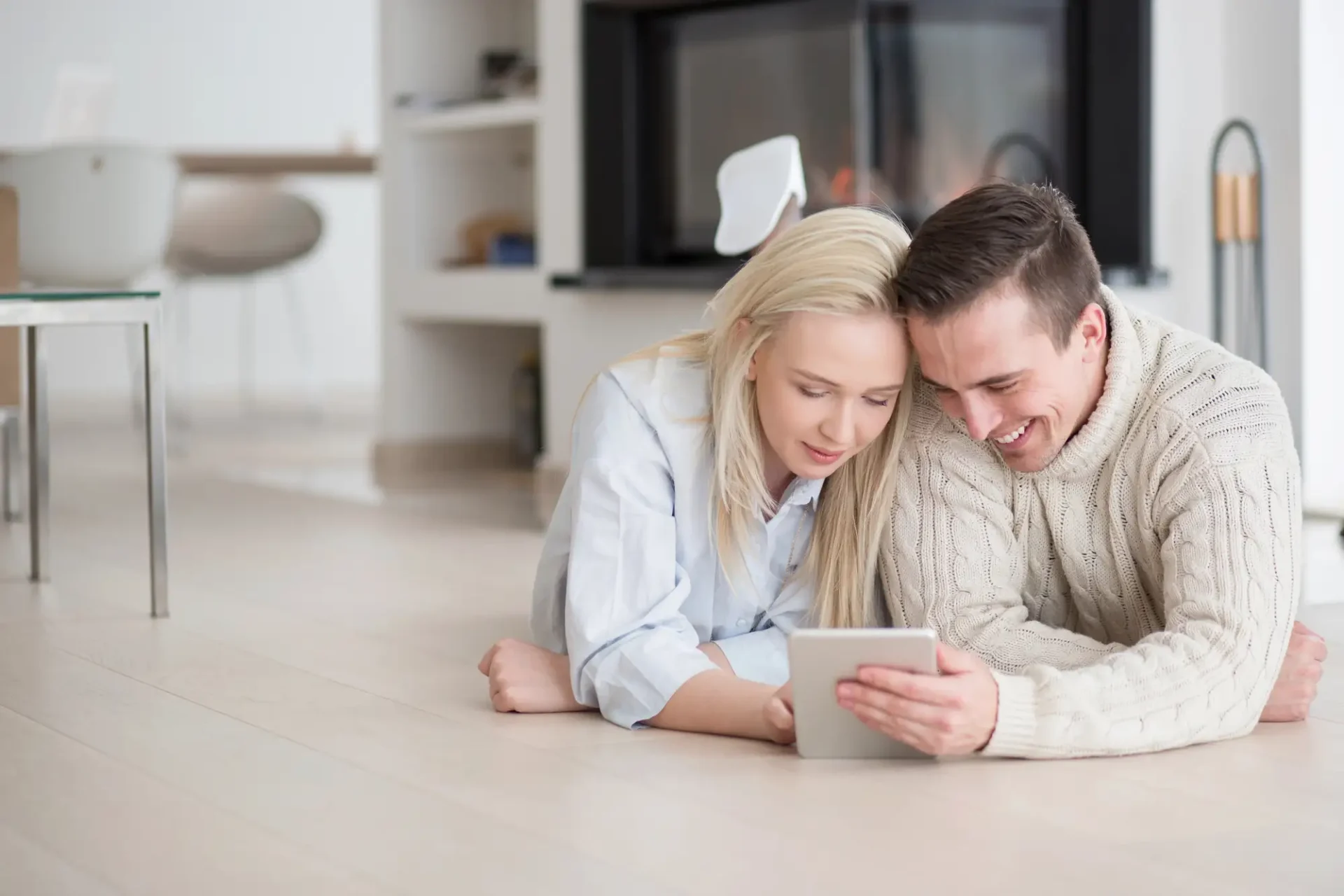 husband wife smiling in clean home